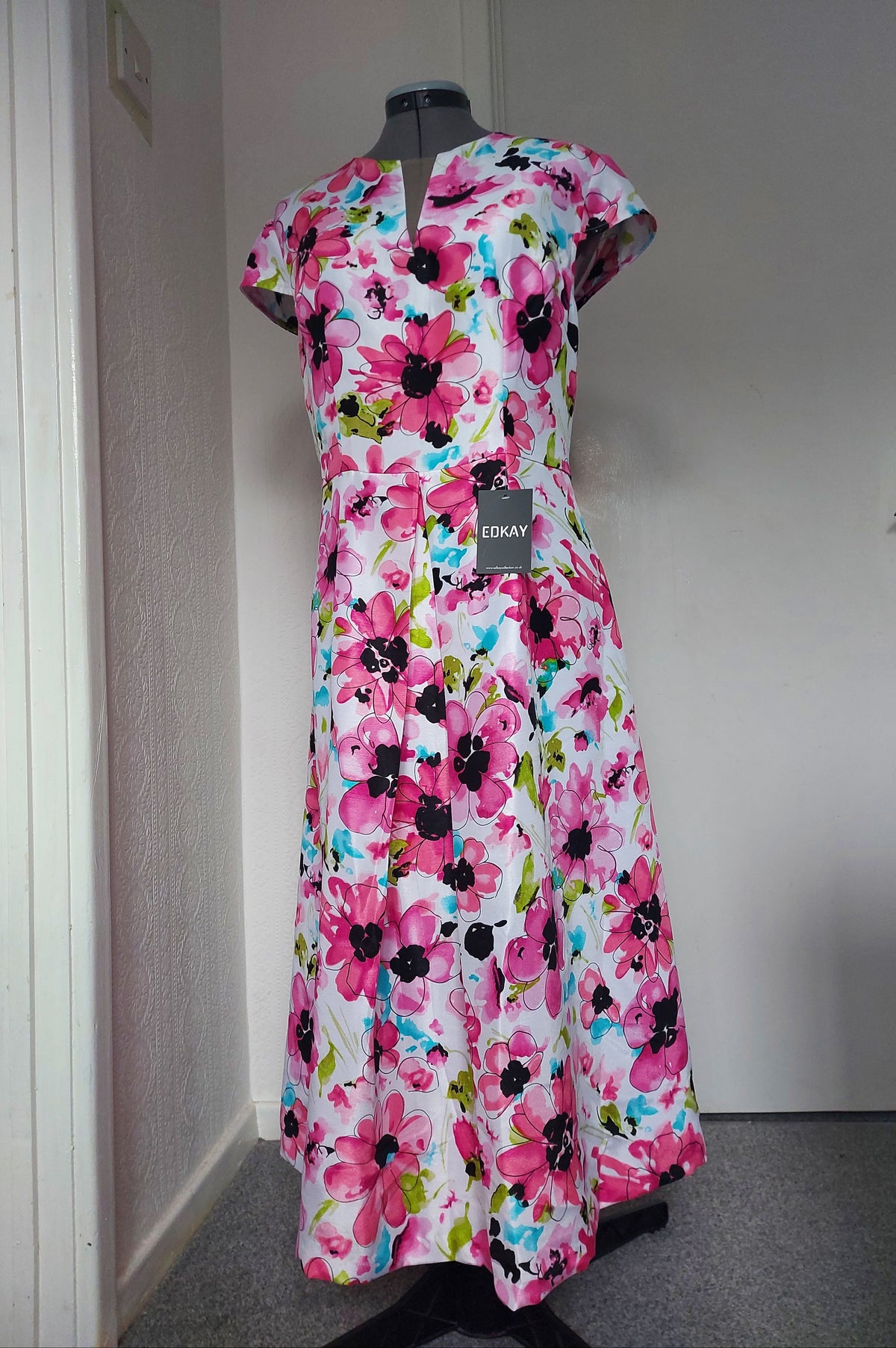 Floral Pink Cape Sleeve A-Line Dress Mother of Bride – shown on a dress form
