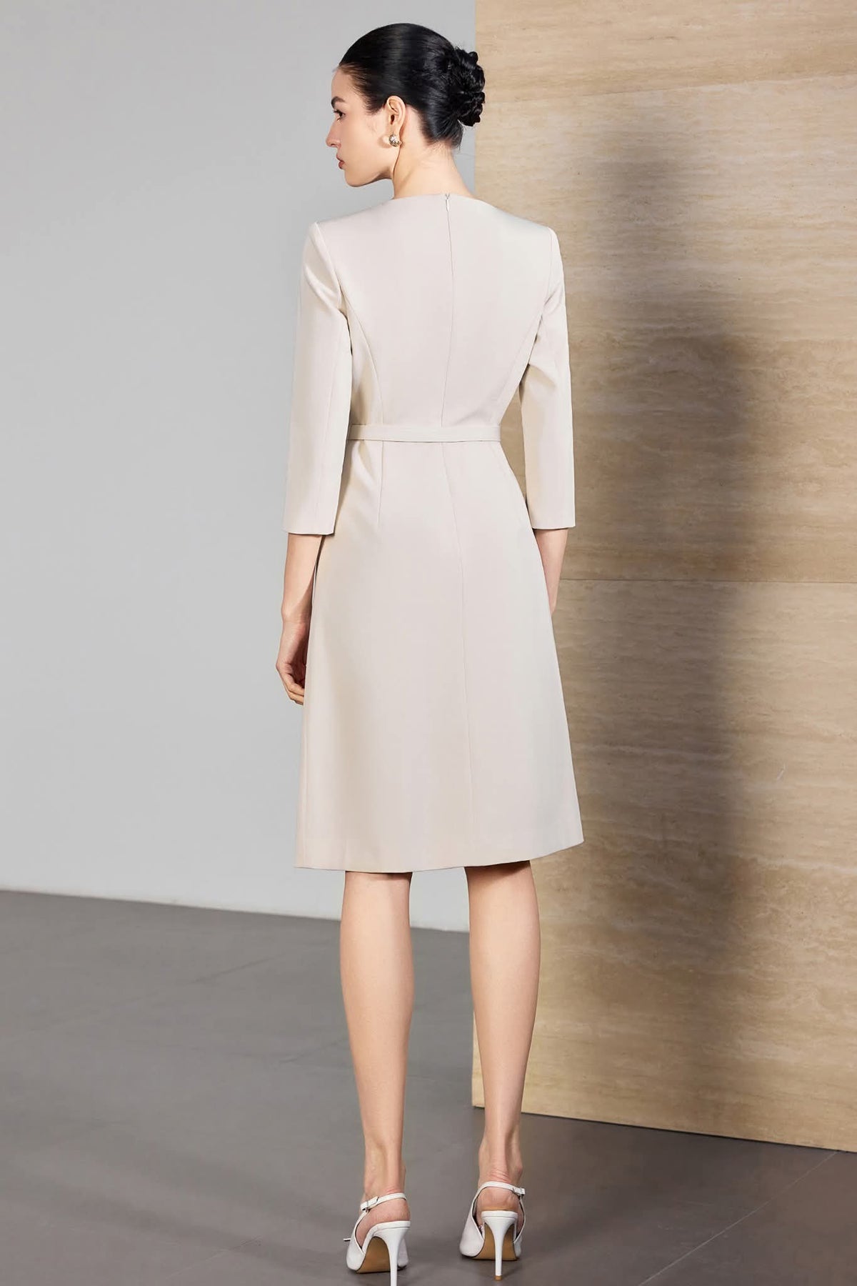 Ivory Poise Midi Dress Tailored Beige Dress with Gold Detail – back view, worn by a model