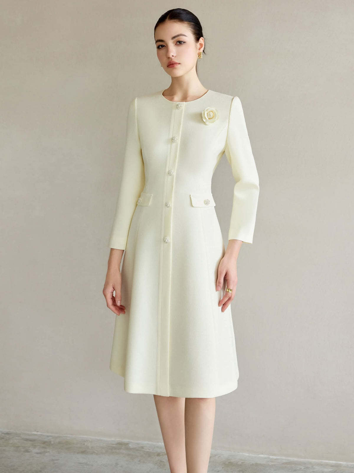 Ivory Regal Coat Dress Pearl Buttons Tailored A-Line Elegance – front view, worn by a model