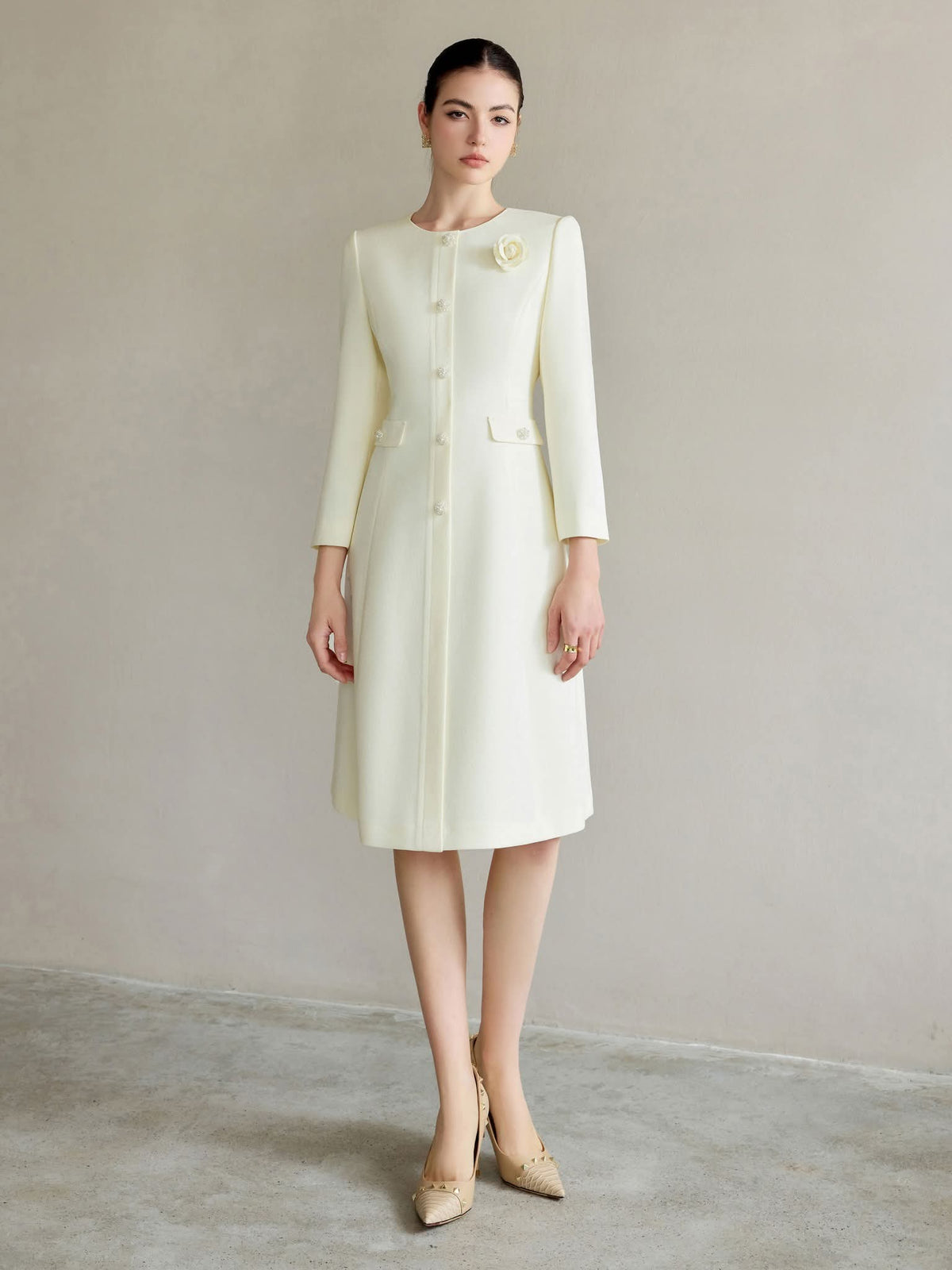 Ivory Regal Coat Dress Pearl Buttons Tailored A-Line Elegance – another front view, worn by a model