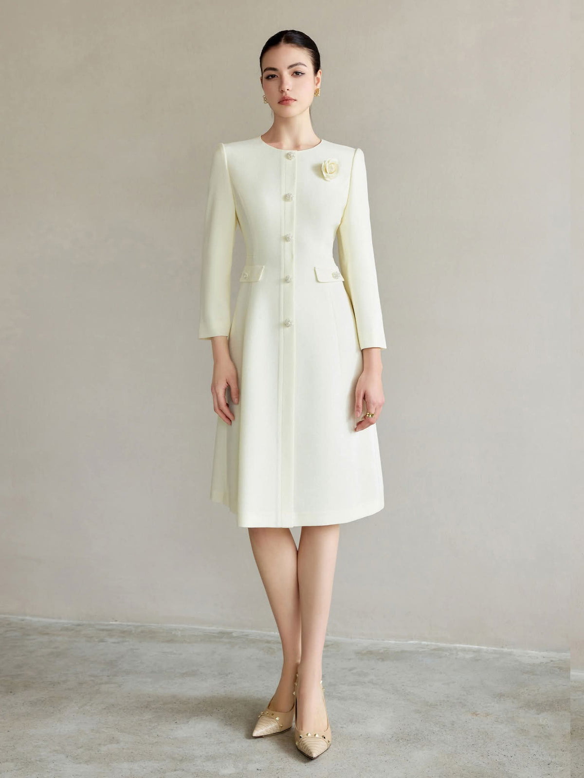 Ivory Regal Coat Dress Pearl Buttons Tailored A-Line Elegance – another front view, worn by a model