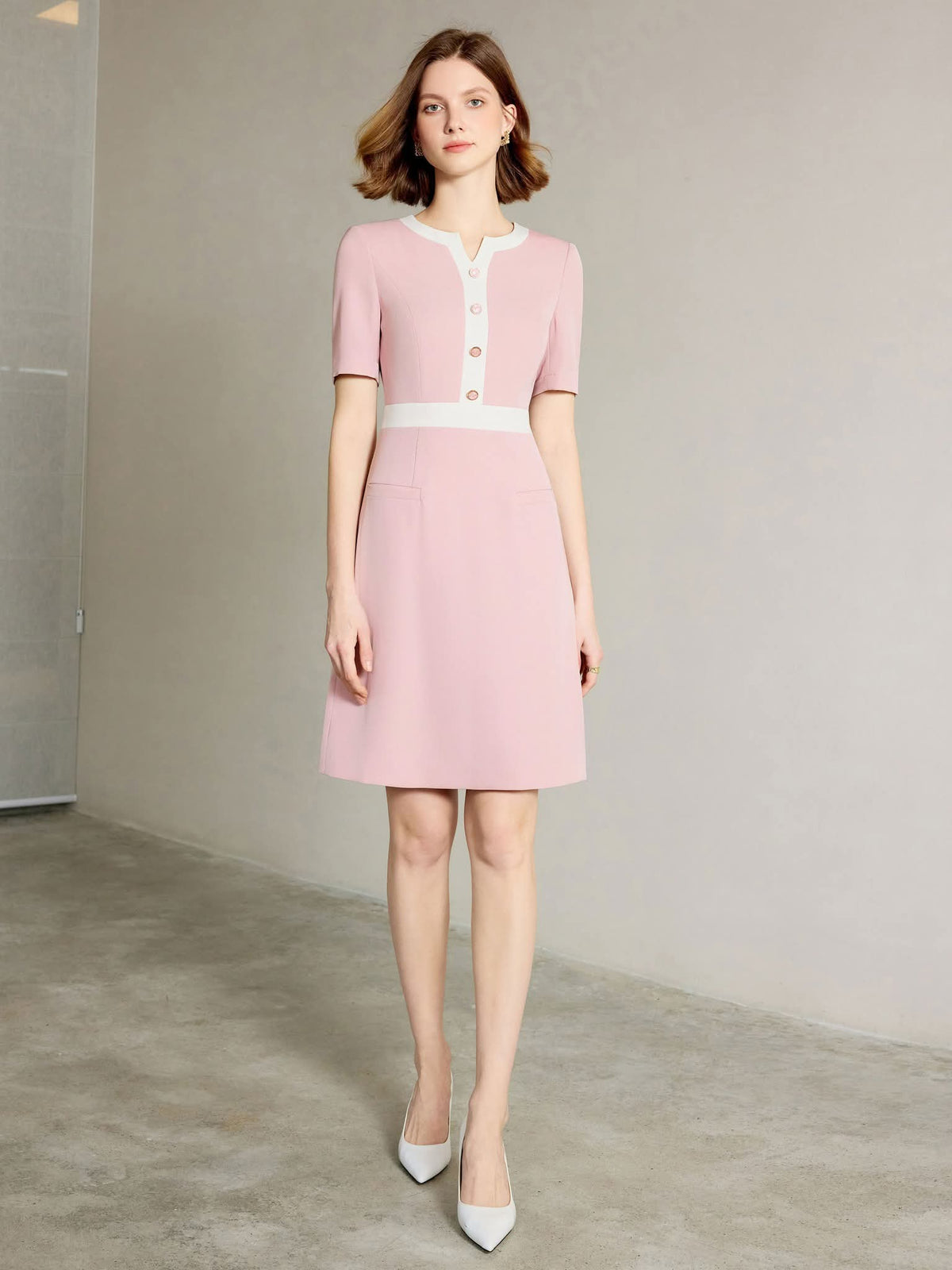 Rosewood Blush Pink Tailored Dress with Gold Button Detail – another front view, worn by a model